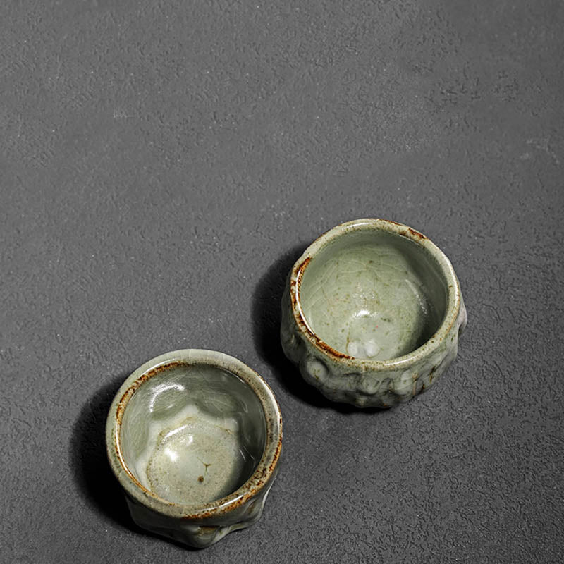 Buddha Stones手作りのシンプルなひび割れた氷の質感の中国Jianzhanセラミックティーカップカンフーティーカップ