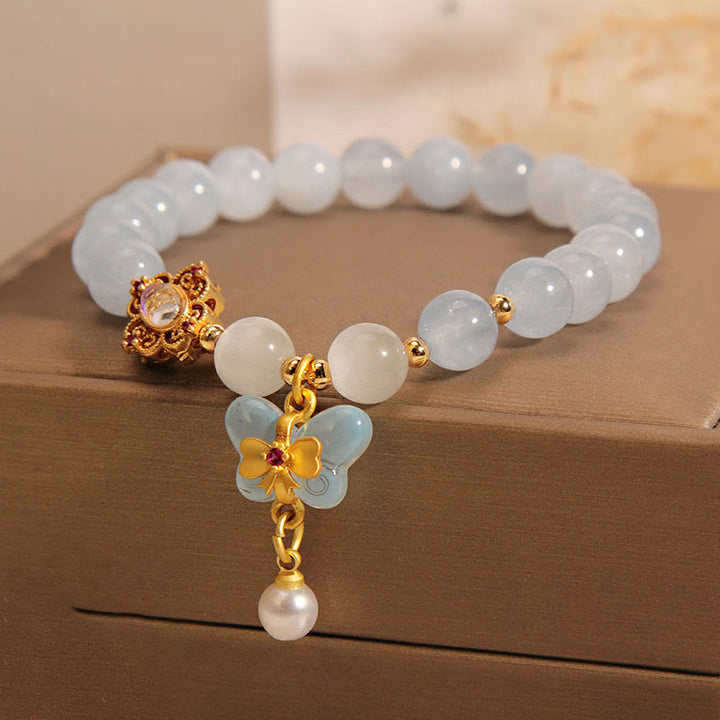 Buddha Stonesアクアマリン キャッツアイ ヒーリングバタフライパール チャームブレスレット