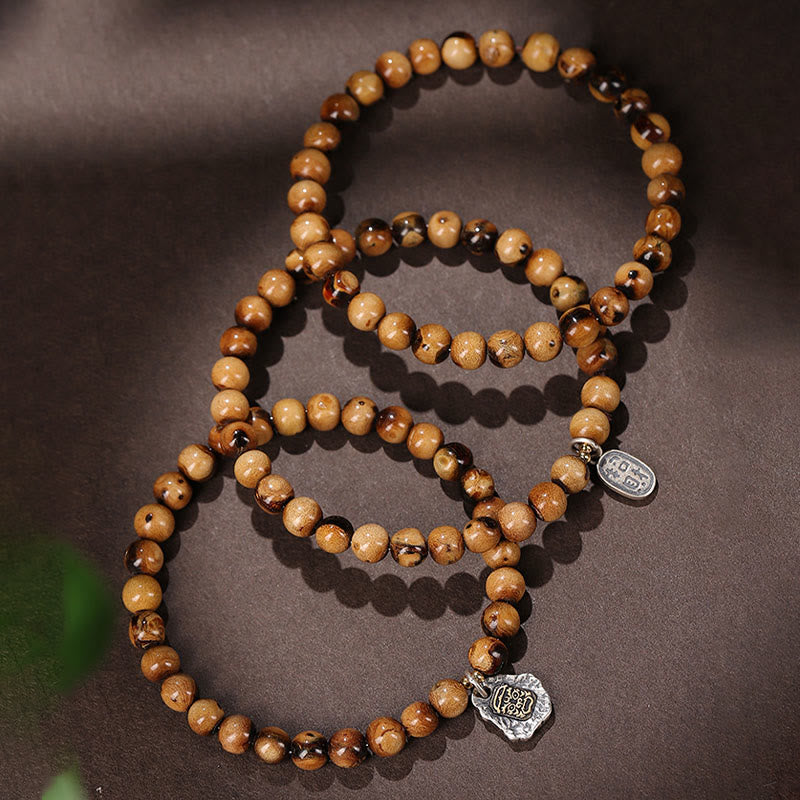 Buddha Stones925 スターリングシルバー 天然黄金の海柳 ザキラム 富の女神 幸運 福 キャラクター 成功 ブレスレット - image 1