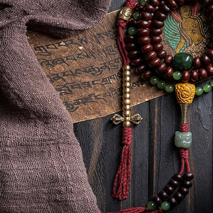 Buddha Stones天然チベット 108 個入りMalaビーズ 紫菩提樹 和田翡翠 銅製 ドルジェ 平和ブレスレット