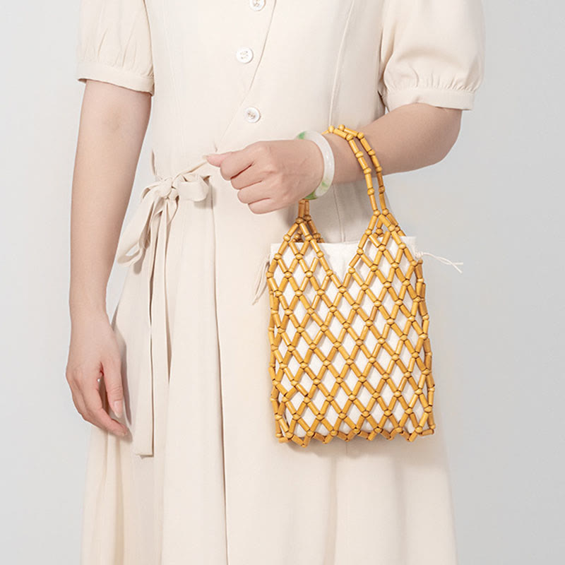 Buddha Stonesの手編みメッシュ中空木製ビーズハンドバッグ