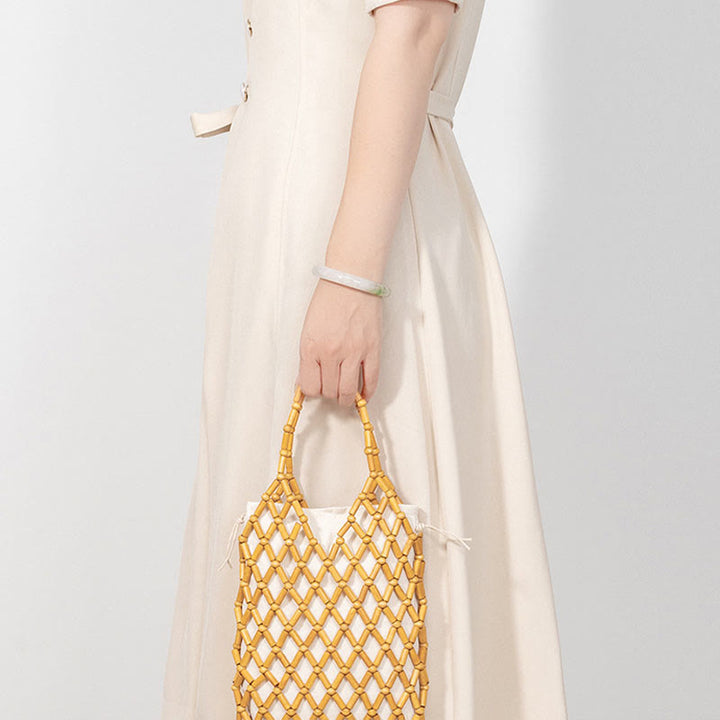 Buddha Stonesの手編みメッシュ中空木製ビーズハンドバッグ