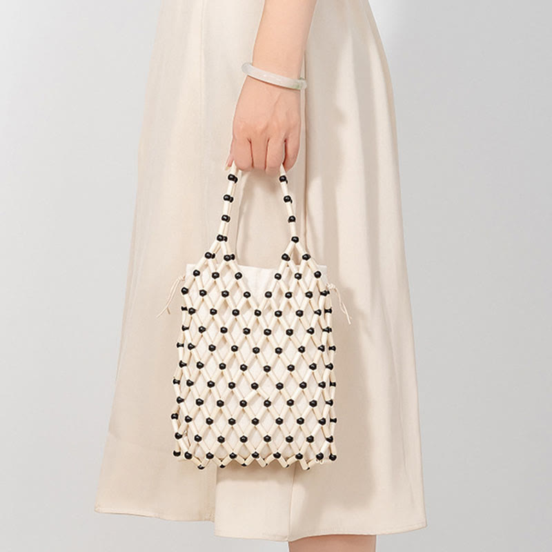 Buddha Stonesの手編みメッシュ中空木製ビーズハンドバッグ