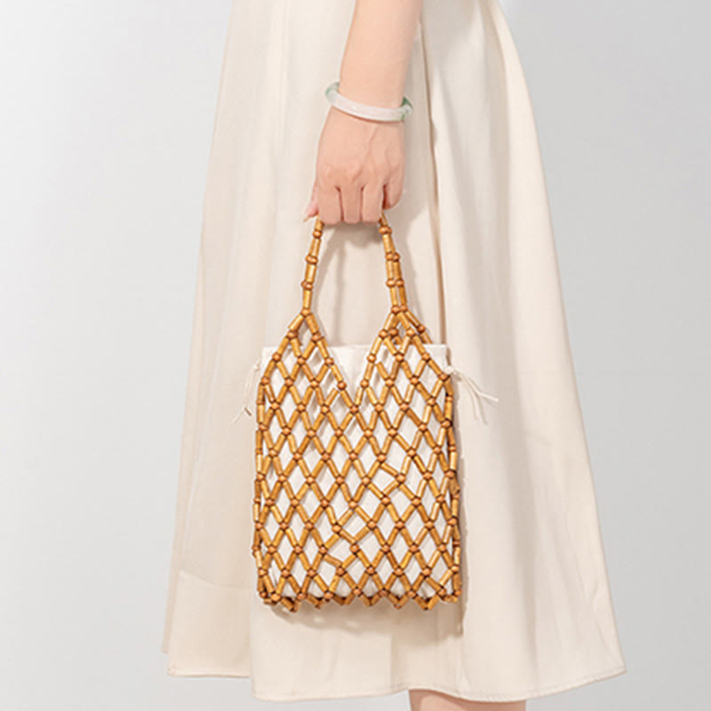 Buddha Stonesの手編みメッシュ中空木製ビーズハンドバッグ