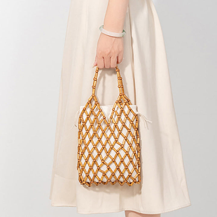 Buddha Stonesの手編みメッシュ中空木製ビーズハンドバッグ