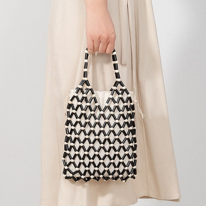 Buddha Stonesの手編みメッシュ中空木製ビーズハンドバッグ