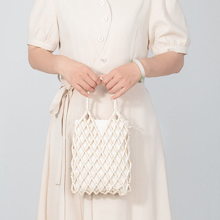 Buddha Stonesの手編みメッシュ中空木製ビーズハンドバッグ