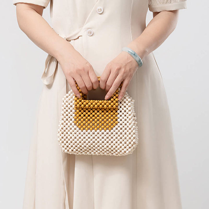 Buddha Stonesの手編み木製ビーズスクエアトートハンドバッグ