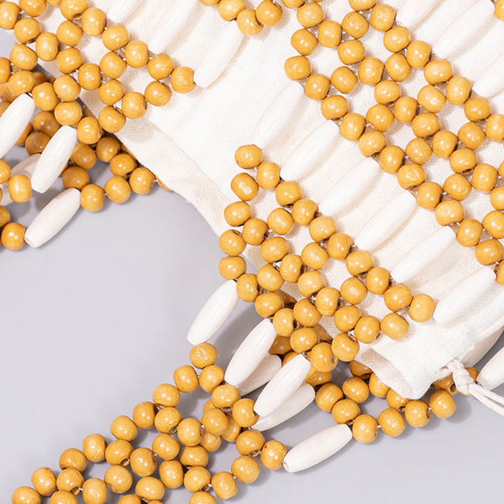 Buddha Stonesの手編み丸型木製ビーズショルダーバッグ