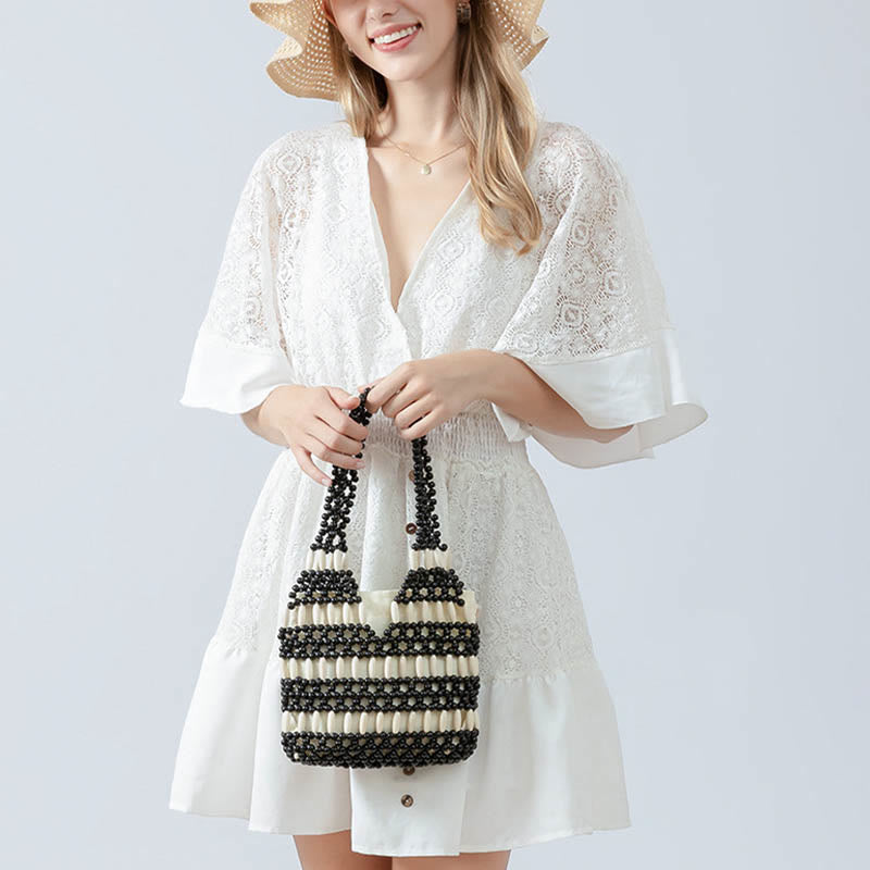 Buddha Stonesの手編み丸型木製ビーズショルダーバッグ