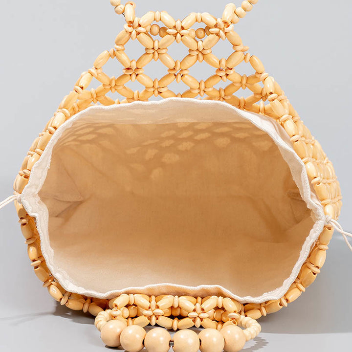 Buddha Stonesの手編み釣り糸編みメッシュ中空木製ビーズハンドバッグ