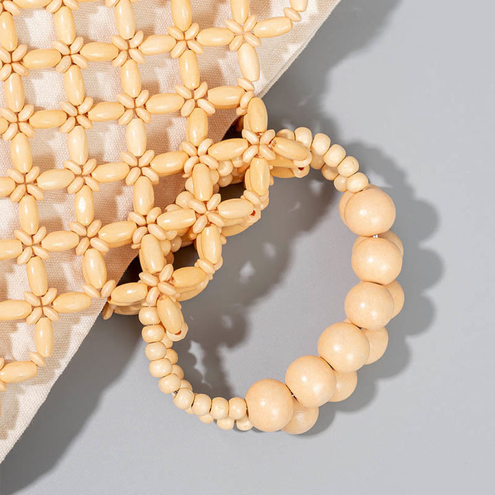 Buddha Stonesの手編み釣り糸編みメッシュ中空木製ビーズハンドバッグ