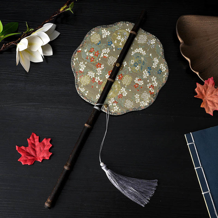 Buddha Stones手作り 花 桃色 ビワ 鳥 鶴 蝶柄 長い紫色の竹製ハンドル 携帯用 巻き上げ式扇風機