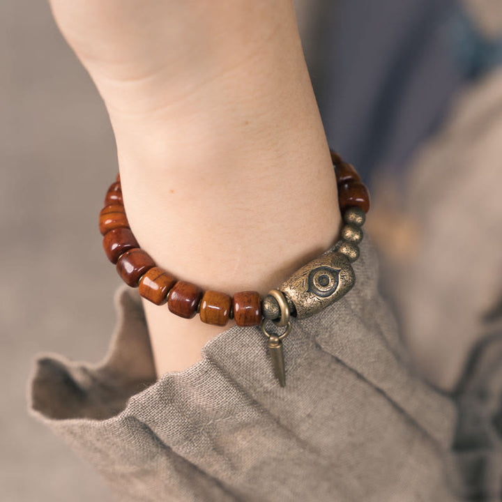 Buddha Stonesヤクの骨Dziシェイプ銅コーンペンダント強度ブレスレット