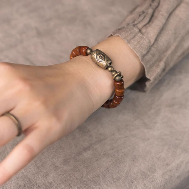 Buddha Stonesヤクの骨Dziシェイプ銅コーンペンダント強度ブレスレット