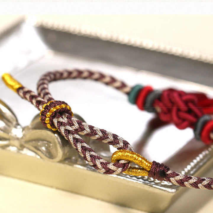 Buddha Stonesカラフル紐 桃の花結び タッセル 守護ブレスレット