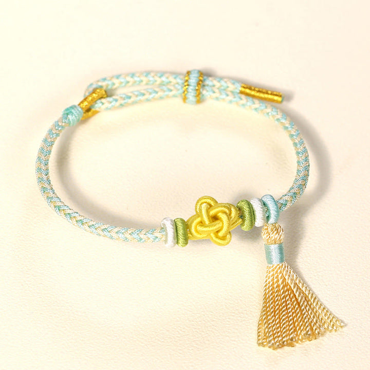 Buddha Stonesカラフル紐 桃の花結び タッセル 守護ブレスレット