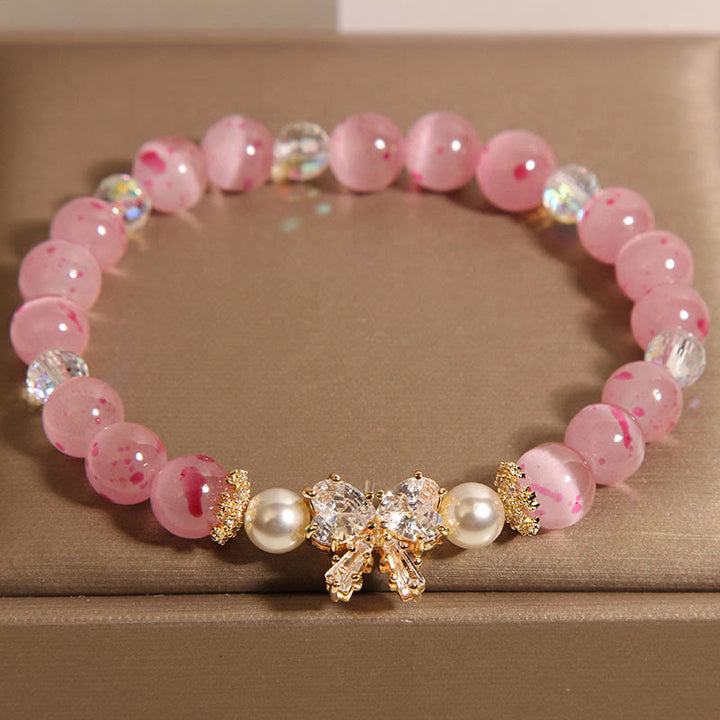 Buddha Stones桜 ピンク キャッツアイ パール 蝶結び ロゼット サポート ブレスレット