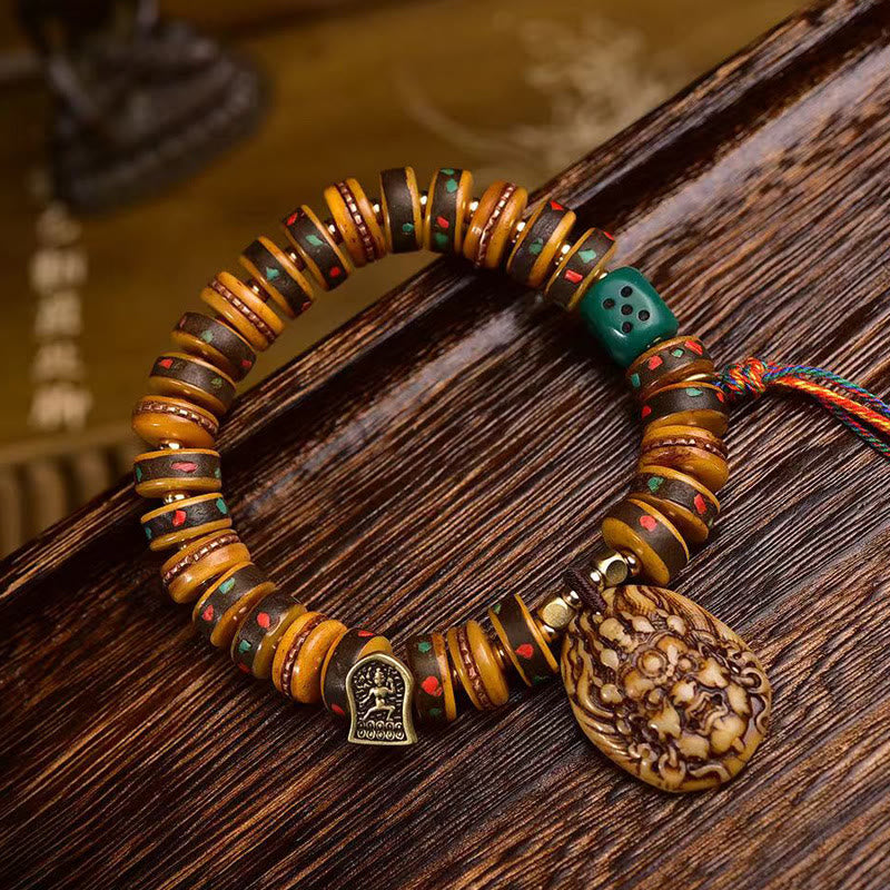 Buddha Stonesチベットラクダ骨サイコロタッセル保護ブレスレット