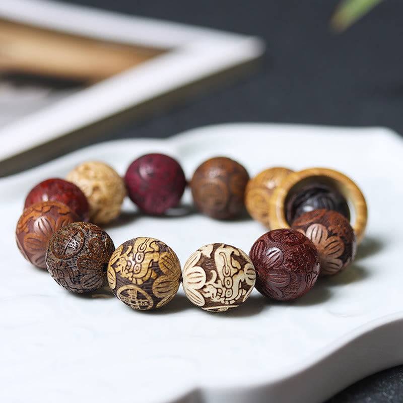 Buddha Stones彫刻 白檀 十二支 縁起の良い龍 鳳凰 福文字 ヒーリングブレスレット