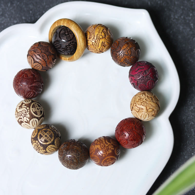 Buddha Stones彫刻 白檀 十二支 縁起の良い龍 鳳凰 福文字 ヒーリングブレスレット