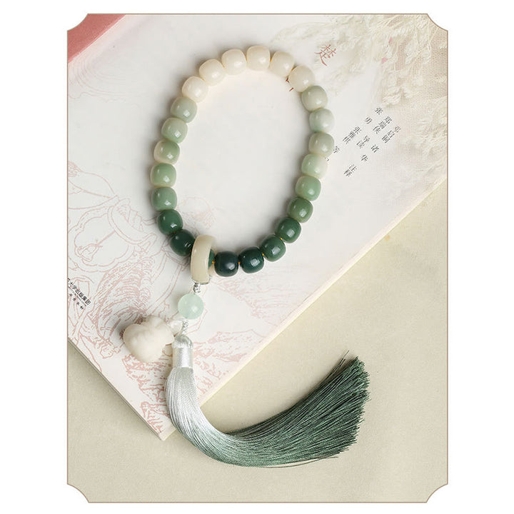 Buddha Stonesナチュラルグラデーション 菩提樹 幸運 マネーバッグ 蓮 知恵 タッセル リストMala