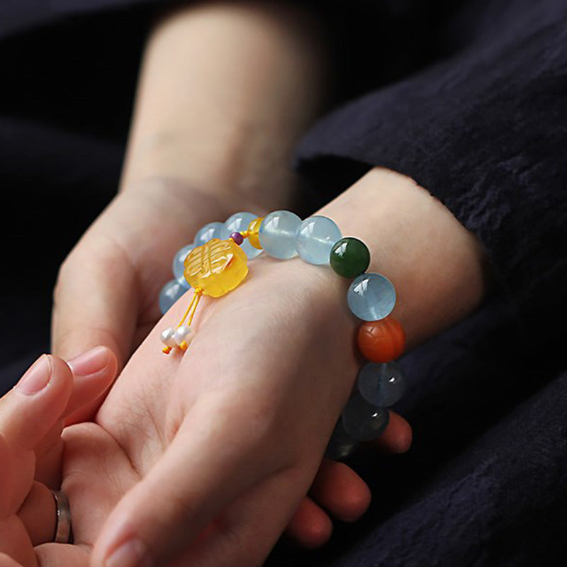 天然アクアマリンと琥珀の中国結びチャームの平和ブレスレット