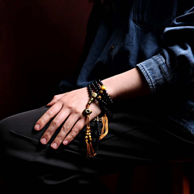 Buddha Stonesチベット 108 個Malaビーズ ブラックオニキス タイガーアイビーズ 九宮 八卦 守護ブレスレット