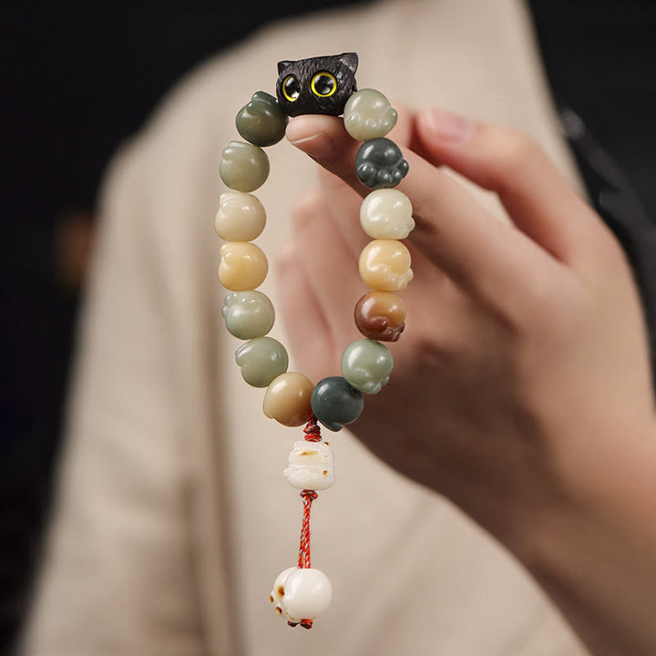 Buddha Stones天然菩提樹 愛らしい足跡黒檀招き猫 知恵のブレスレット - image 9