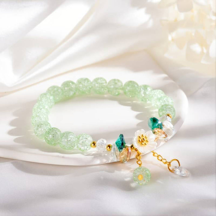Buddha Stonesのシンプルなデザインの花のチャームガラスビーズブレスレット