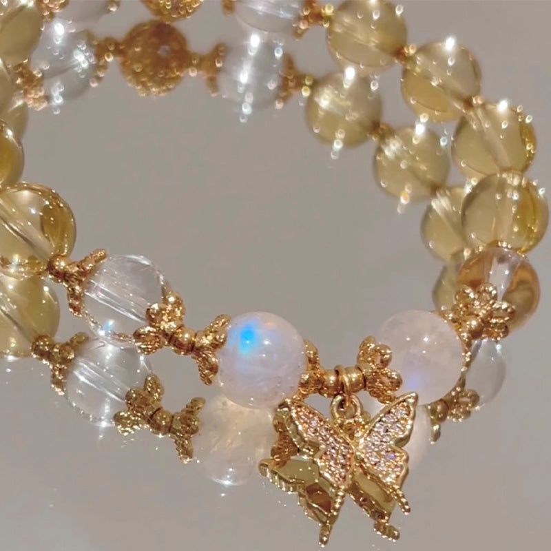Buddha Stonesシトリン ムーンストーン バタフライチャーム 繁栄の守護ブレスレット
