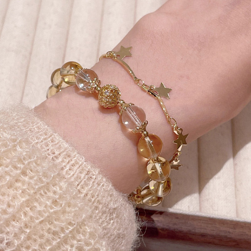 Buddha Stonesシトリン ムーンストーン バタフライチャーム 繁栄の守護ブレスレット