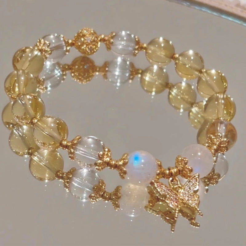 Buddha Stonesシトリン ムーンストーン バタフライチャーム 繁栄の守護ブレスレット