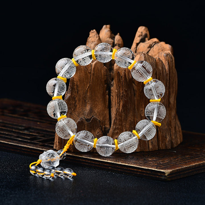 Buddha Stonesチベット ホワイトクリスタル 半鬼半仏 般若心経 蓮華 ヒーリングブレスレット