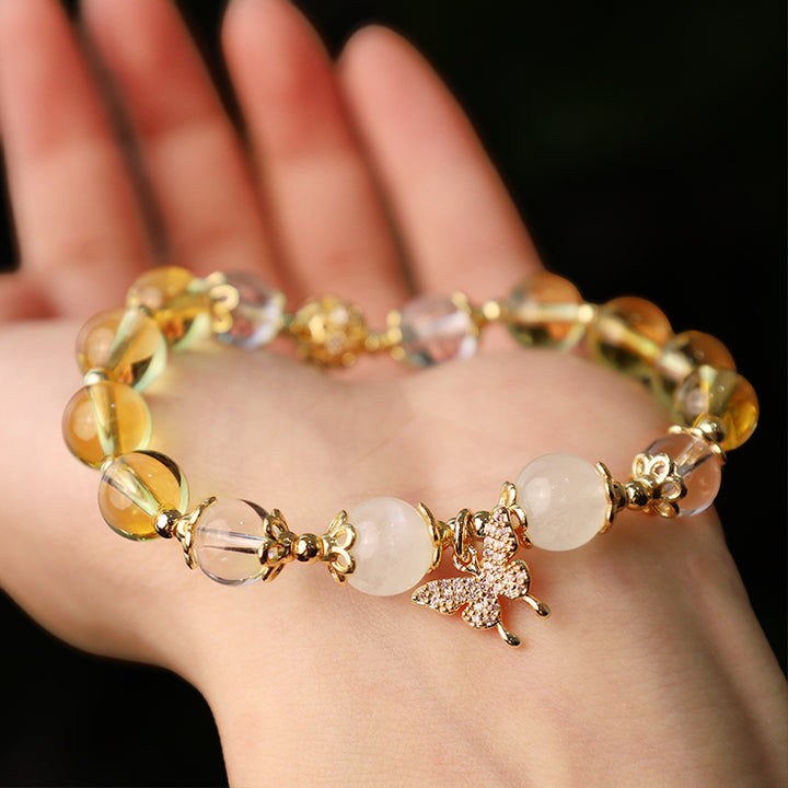 Buddha Stonesシトリン ムーンストーン バタフライチャーム 繁栄の守護ブレスレット