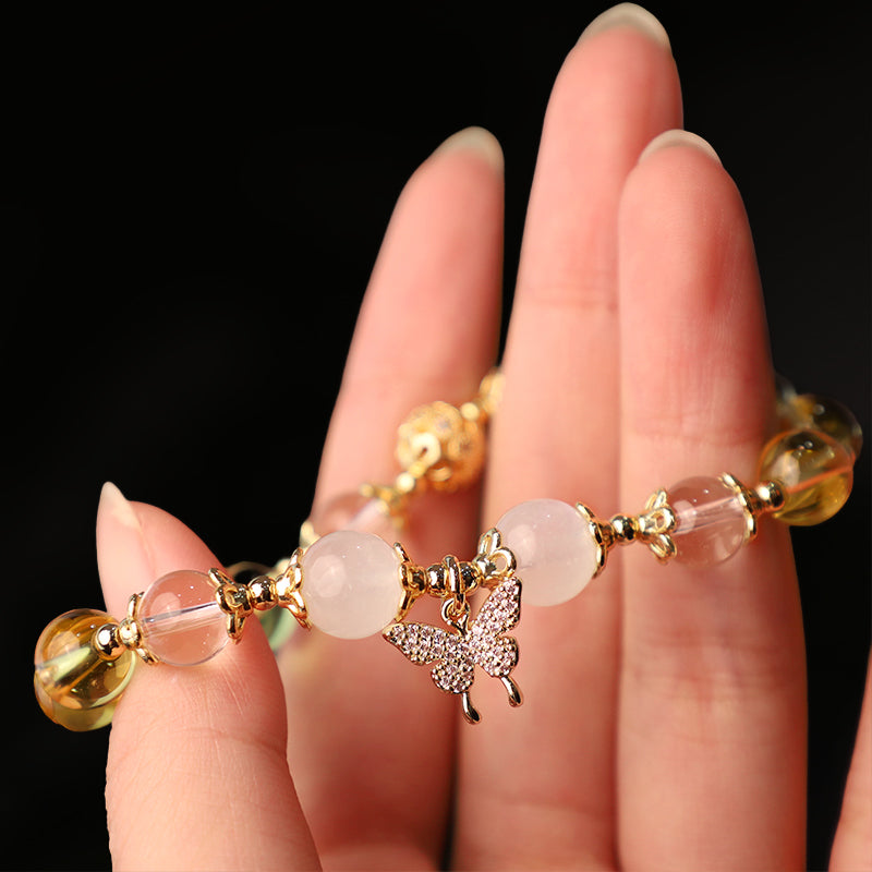 Buddha Stonesシトリン ムーンストーン バタフライチャーム 繁栄の守護ブレスレット