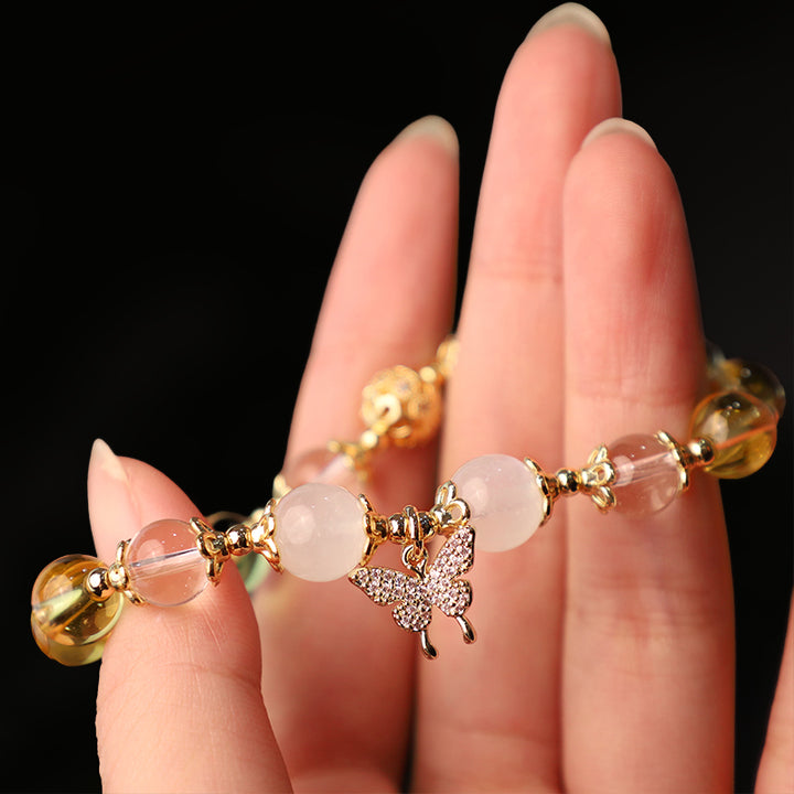 Buddha Stonesシトリン ムーンストーン バタフライチャーム 繁栄の守護ブレスレット