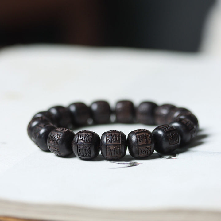 Buddha Stonesチベット黒檀オーム・マニ・パドメ・フム彫刻 バランスブレスレット