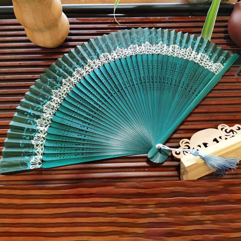 Buddha Stonesのシンプルな中空彫刻が施された手持ちの竹製扇子 - image 1