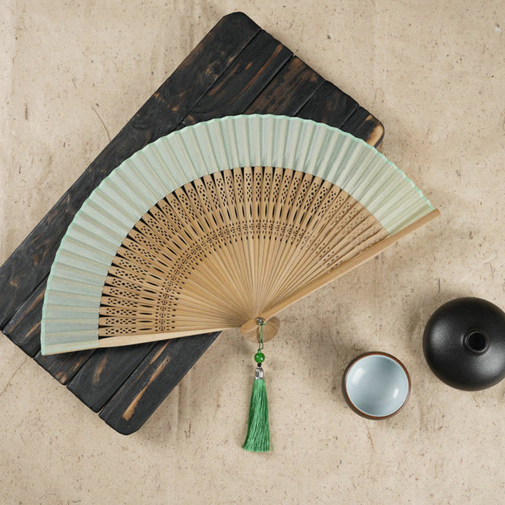 Buddha Stonesシンプルな桜の花 中空彫刻 手持ち竹扇子 - 緑色 22cm - image 0