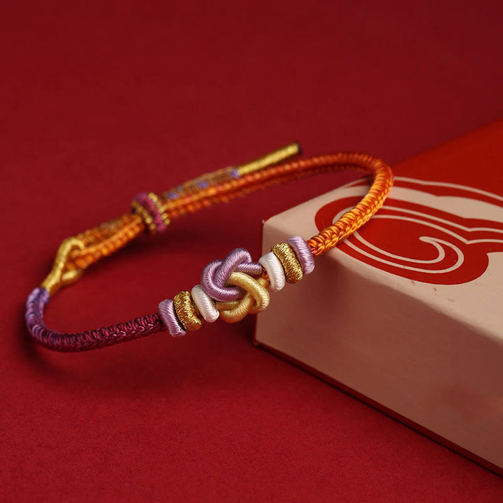 Buddha Stonesのカラフルな紐ハートノット保護編みブレスレット