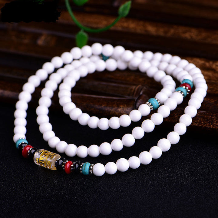 Buddha Stones 108 個のMalaビーズ 白磁 6 つの真実の言葉「Om Mani Padme Hum」忍耐ブレスレット