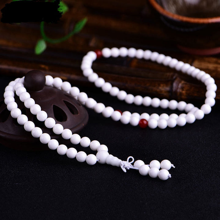 Buddha Stones 108 個のMalaビーズ 白磁 6 つの真実の言葉「Om Mani Padme Hum」忍耐ブレスレット