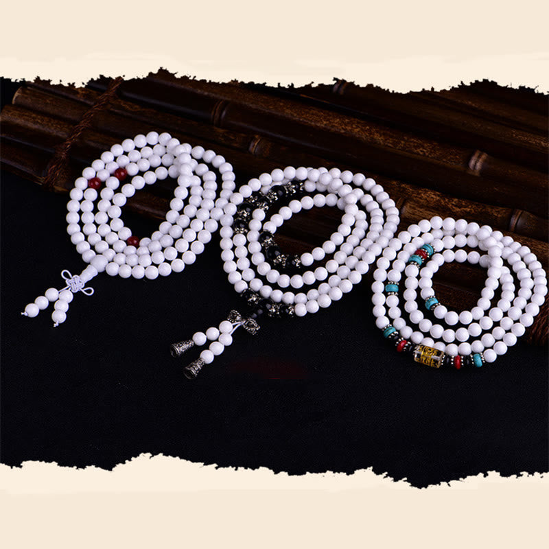 Buddha Stones 108 個のMalaビーズ 白磁 6 つの真実の言葉「Om Mani Padme Hum」忍耐ブレスレット