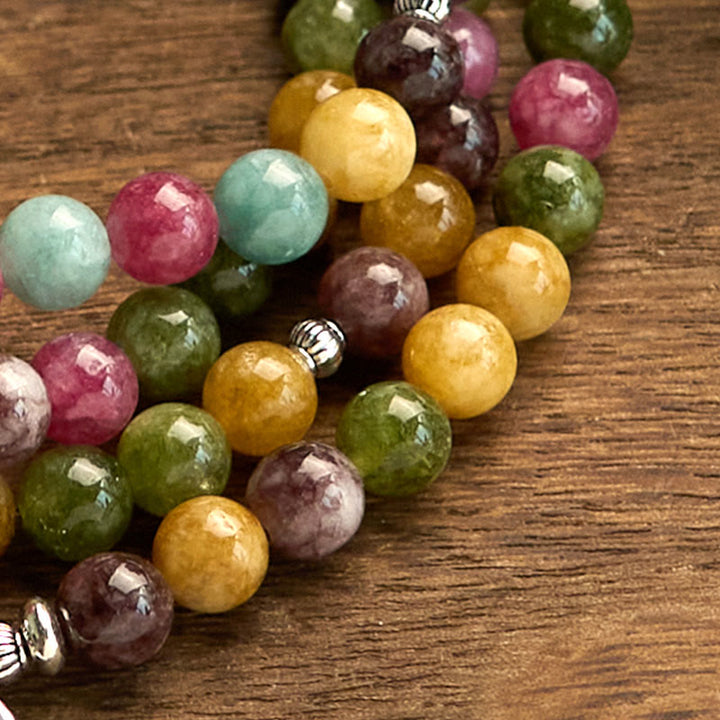 Buddha Stones 108 個入りMalaビーズ 多層天然トルマリン 蓮の知恵ブレスレット