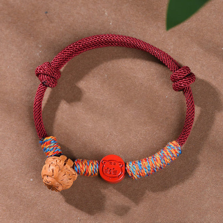 Buddha Stonesハンドメイドの十二支の赤紐の辰砂の幸運ブレスレット