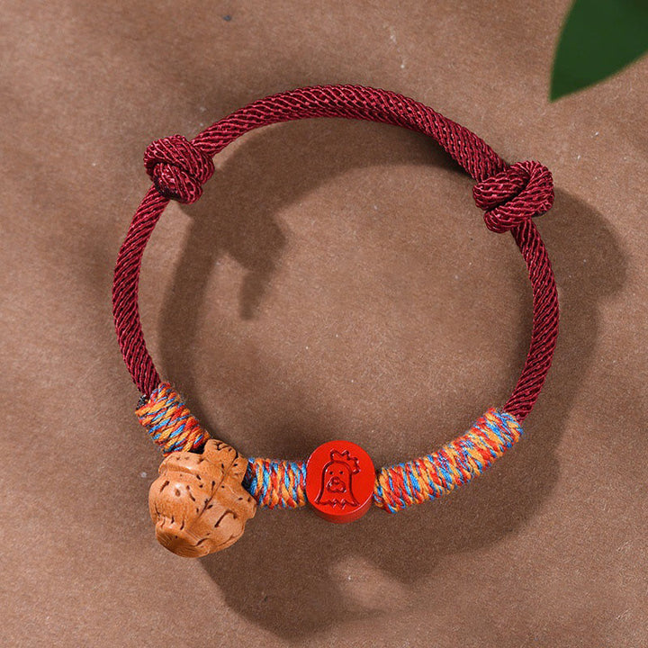 Buddha Stonesハンドメイドの十二支の赤紐の辰砂の幸運ブレスレット