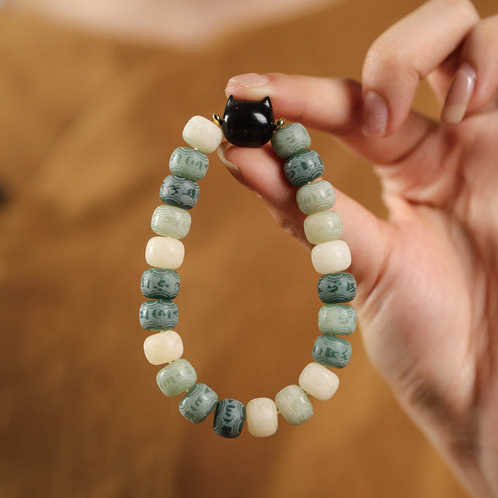 Buddha Stonesの実オーム・マニ・パドメ・フム彫刻 銀色 光沢 黒曜石 猫の頭 知恵のブレスレット - image 12