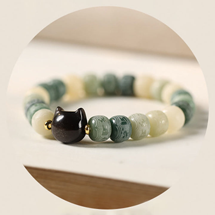 Buddha Stonesの実オーム・マニ・パドメ・フム彫刻 銀色 光沢 黒曜石 猫の頭 知恵のブレスレット - image 16