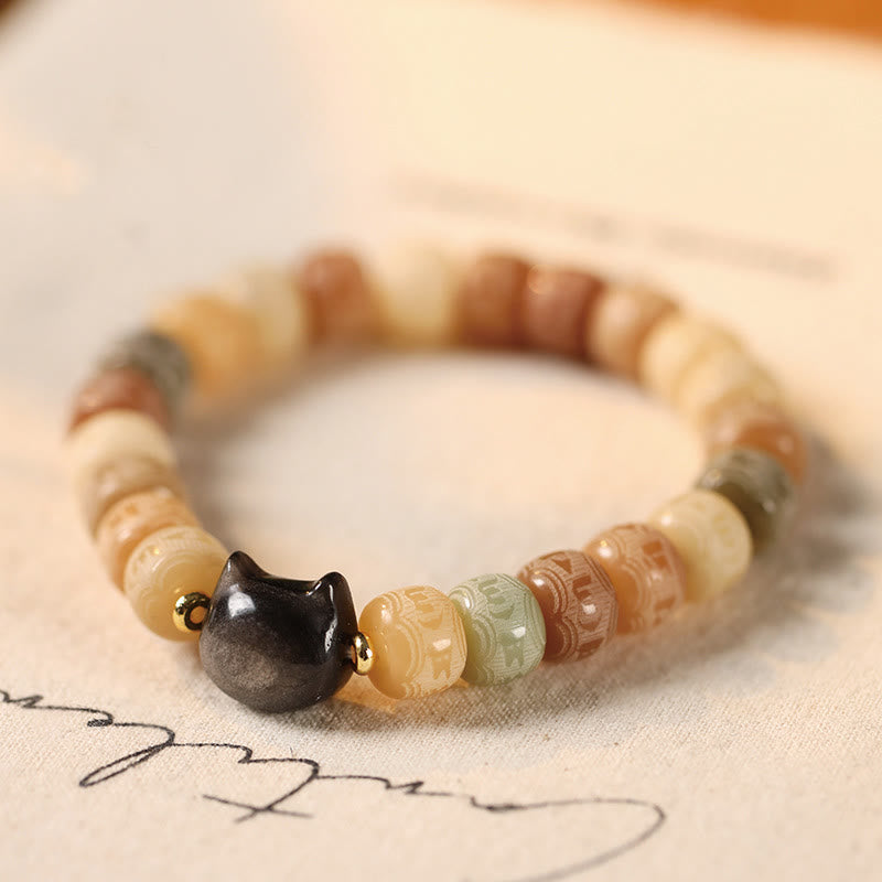 Buddha Stonesの実オーム・マニ・パドメ・フム彫刻 銀色 光沢 黒曜石 猫の頭 知恵のブレスレット - 8×10mm イエロー菩提樹（手首周り14～16cm） - image 1
